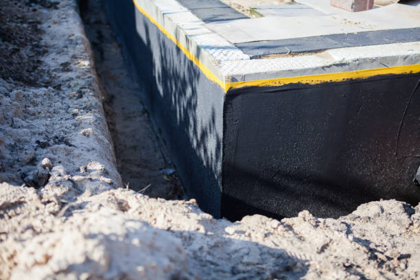Professional Waterproofing technician working in Sears, MI